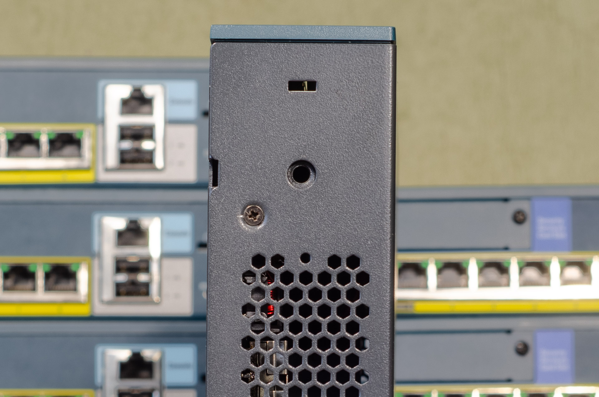 Unscrew these bolts to open the Cisco CT2504 chassis Location of the bolts holding the Cisco CT2504 cover